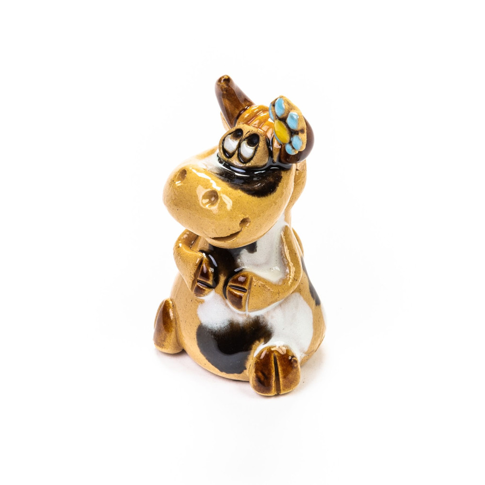 Keramik Minifigur - Kuh sitzend mit Blumen am Horn - gemischte Farben Keramik Minifigur - Kuh sitzend mit Blumen am Horn - gemischte Farben