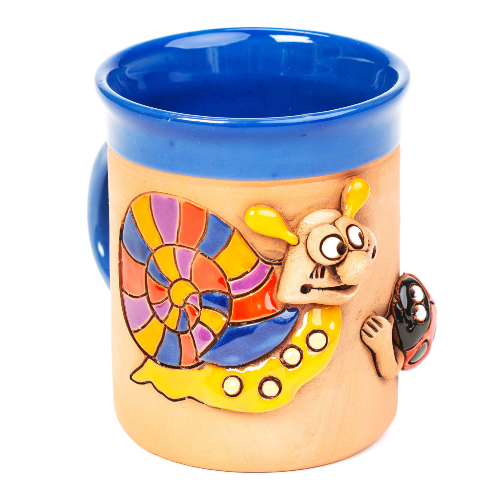 Coupe en céramique bleue avec un escargot et une Marienkäfig Coupe en céramique bleue avec un escargot et une Marienkäfig