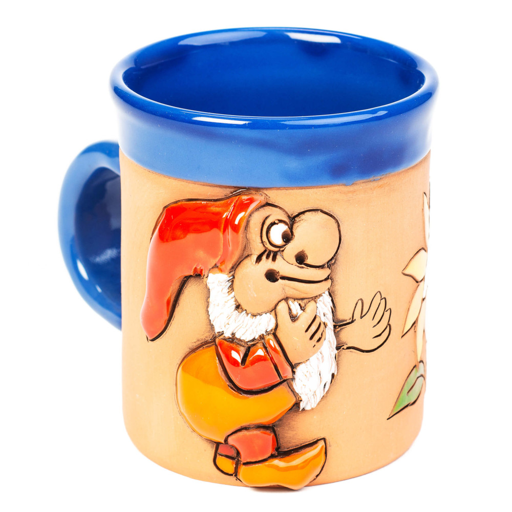 Coupe en céramique bleue avec une coque rouge et une fleur Coupe en céramique bleue avec une coque rouge et une fleur