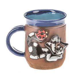 Coupe en céramique bleue avec un chat avec cage de dame sur sa bite